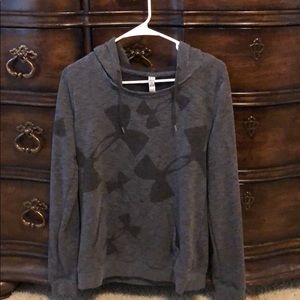 Under Armour pullover with front pocket.